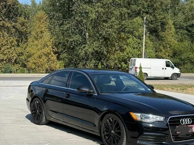Черный Ауди А6, объемом двигателя 2 л и пробегом 283 тыс. км за 9750 $, фото 1 на Automoto.ua