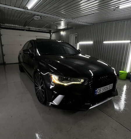 Черный Ауди А6, объемом двигателя 2 л и пробегом 168 тыс. км за 14300 $, фото 1 на Automoto.ua
