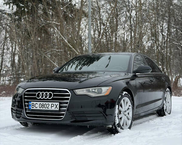 Черный Ауди А6, объемом двигателя 2 л и пробегом 290 тыс. км за 13800 $, фото 1 на Automoto.ua