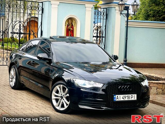 Черный Ауди А6, объемом двигателя 2 л и пробегом 264 тыс. км за 11500 $, фото 1 на Automoto.ua