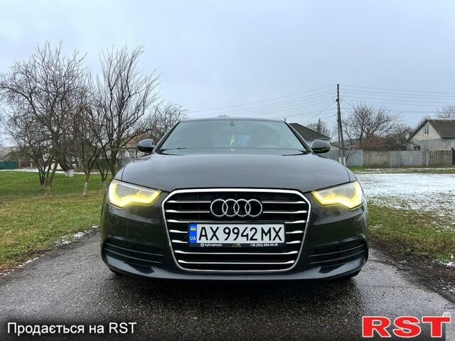 Черный Ауди А6, объемом двигателя 2 л и пробегом 248 тыс. км за 12500 $, фото 1 на Automoto.ua