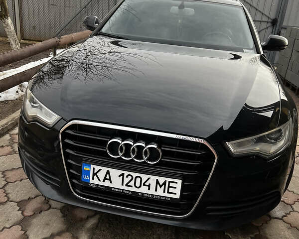 Черный Ауди А6, объемом двигателя 1.98 л и пробегом 220 тыс. км за 10900 $, фото 1 на Automoto.ua