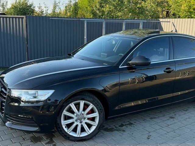 Черный Ауди А6, объемом двигателя 2 л и пробегом 180 тыс. км за 13400 $, фото 1 на Automoto.ua