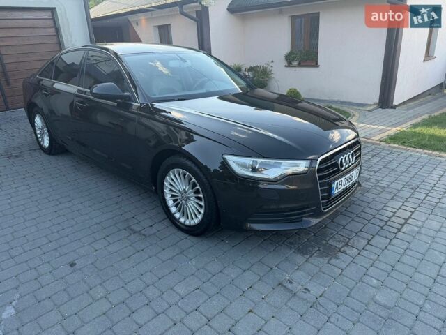 Черный Ауди А6, объемом двигателя 1.98 л и пробегом 325 тыс. км за 9200 $, фото 1 на Automoto.ua
