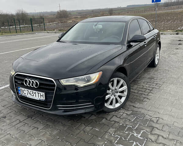 Черный Ауди А6, объемом двигателя 2 л и пробегом 194 тыс. км за 13700 $, фото 1 на Automoto.ua