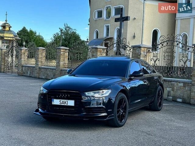 Черный Ауди А6, объемом двигателя 2 л и пробегом 265 тыс. км за 11150 $, фото 1 на Automoto.ua