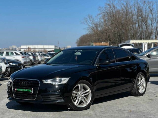 Черный Ауди А6, объемом двигателя 2 л и пробегом 228 тыс. км за 11490 $, фото 1 на Automoto.ua