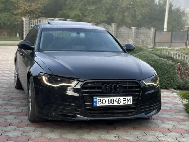 Черный Ауди А6, объемом двигателя 2 л и пробегом 285 тыс. км за 10510 $, фото 1 на Automoto.ua