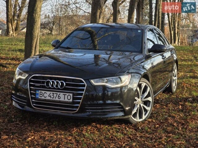 Чорний Ауді А6, об'ємом двигуна 2 л та пробігом 219 тис. км за 12200 $, фото 1 на Automoto.ua