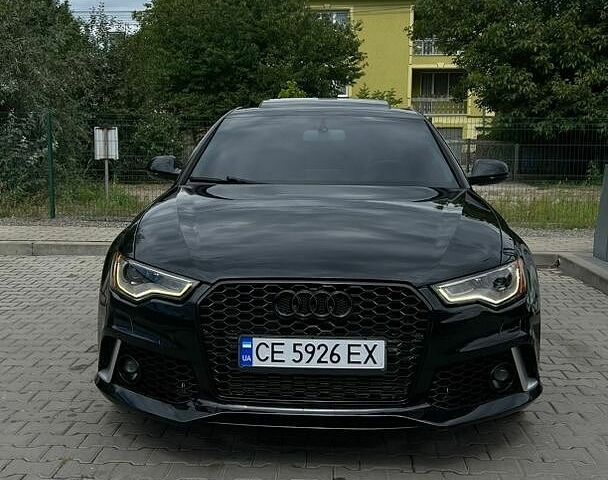 Черный Ауди А6, объемом двигателя 1.98 л и пробегом 183 тыс. км за 11000 $, фото 1 на Automoto.ua