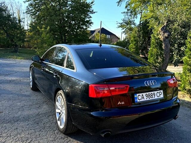 Черный Ауди А6, объемом двигателя 2 л и пробегом 176 тыс. км за 15800 $, фото 1 на Automoto.ua