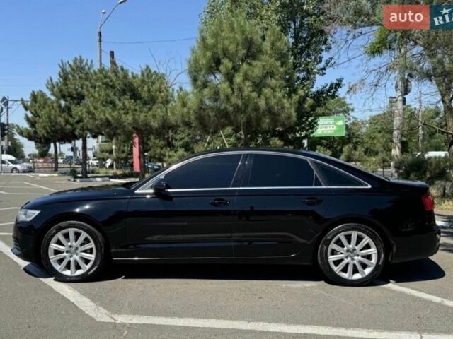 Чорний Ауді А6, об'ємом двигуна 2 л та пробігом 267 тис. км за 12500 $, фото 1 на Automoto.ua