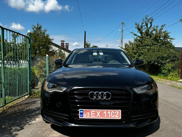 Черный Ауди А6, объемом двигателя 2 л и пробегом 247 тыс. км за 12200 $, фото 1 на Automoto.ua