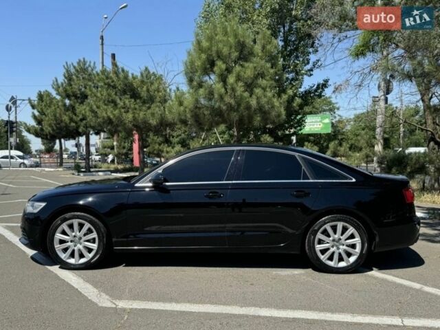 Черный Ауди А6, объемом двигателя 2 л и пробегом 267 тыс. км за 13500 $, фото 1 на Automoto.ua