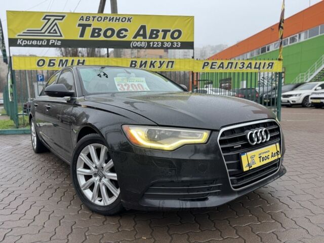 Черный Ауди А6, объемом двигателя 2 л и пробегом 174 тыс. км за 11550 $, фото 1 на Automoto.ua