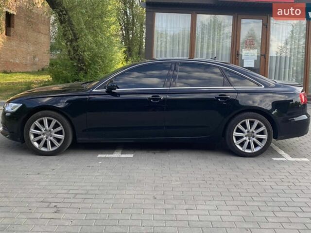 Чорний Ауді А6, об'ємом двигуна 2 л та пробігом 199 тис. км за 14000 $, фото 1 на Automoto.ua