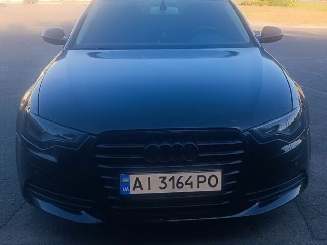 Черный Ауди А6, объемом двигателя 1.98 л и пробегом 192 тыс. км за 11500 $, фото 1 на Automoto.ua
