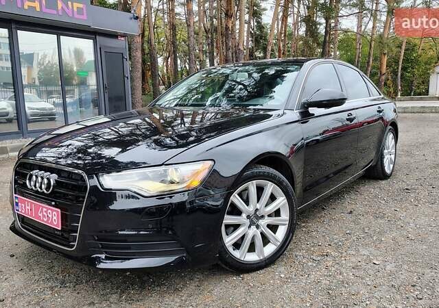Черный Ауди А6, объемом двигателя 2 л и пробегом 196 тыс. км за 12699 $, фото 1 на Automoto.ua