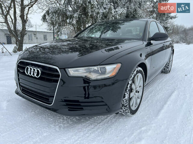 Черный Ауди А6, объемом двигателя 2 л и пробегом 165 тыс. км за 12300 $, фото 1 на Automoto.ua