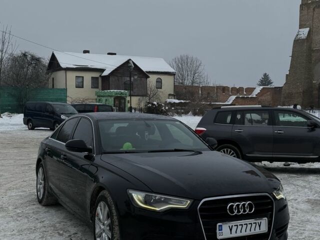 Черный Ауди А6, объемом двигателя 2 л и пробегом 130 тыс. км за 15000 $, фото 1 на Automoto.ua