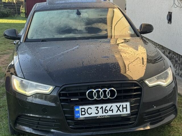 Черный Ауди А6, объемом двигателя 2 л и пробегом 300 тыс. км за 10772 $, фото 1 на Automoto.ua