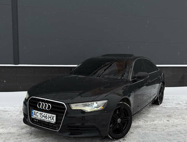 Черный Ауди А6, объемом двигателя 2 л и пробегом 223 тыс. км за 11600 $, фото 1 на Automoto.ua