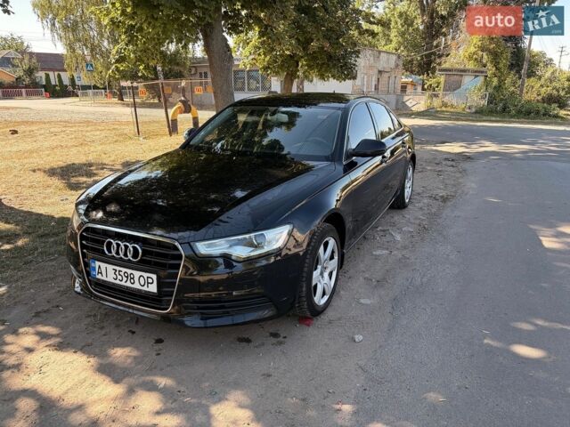 Черный Ауди А6, объемом двигателя 1.98 л и пробегом 260 тыс. км за 10000 $, фото 1 на Automoto.ua