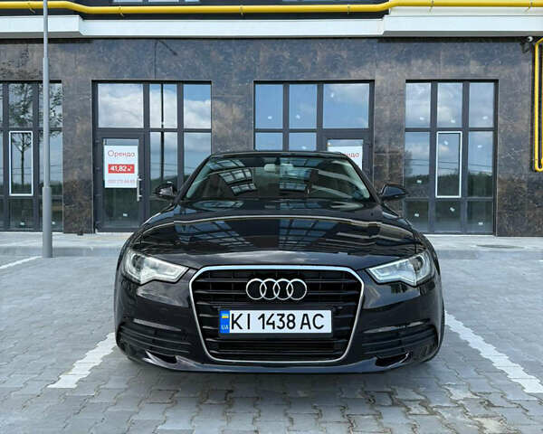 Черный Ауди А6, объемом двигателя 2 л и пробегом 99 тыс. км за 16900 $, фото 1 на Automoto.ua