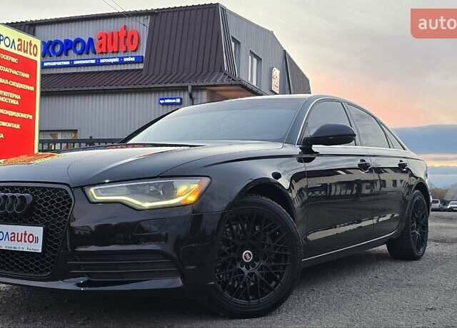 Черный Ауди А6, объемом двигателя 2 л и пробегом 172 тыс. км за 14900 $, фото 1 на Automoto.ua