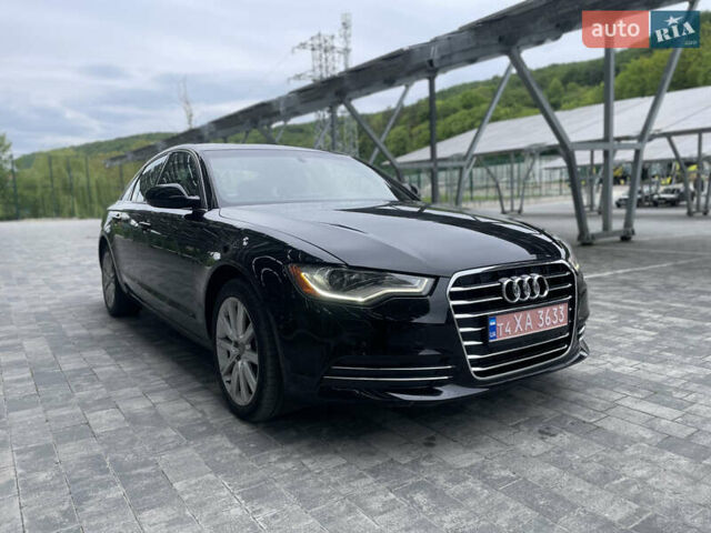 Черный Ауди А6, объемом двигателя 2 л и пробегом 220 тыс. км за 11800 $, фото 1 на Automoto.ua