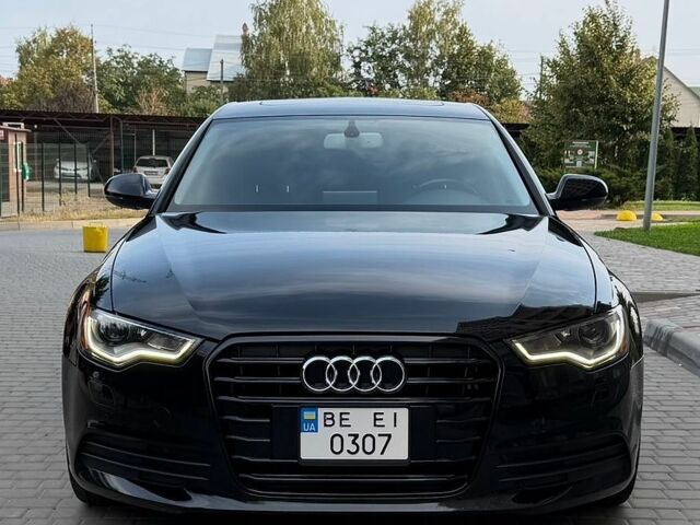 Черный Ауди А6, объемом двигателя 2 л и пробегом 175 тыс. км за 14200 $, фото 1 на Automoto.ua