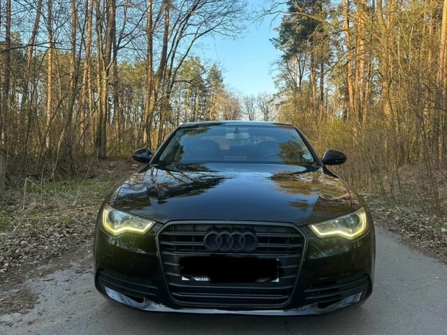 Чорний Ауді А6, об'ємом двигуна 2 л та пробігом 269 тис. км за 11700 $, фото 1 на Automoto.ua