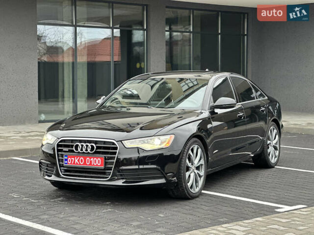 Черный Ауди А6, объемом двигателя 2 л и пробегом 245 тыс. км за 13250 $, фото 1 на Automoto.ua