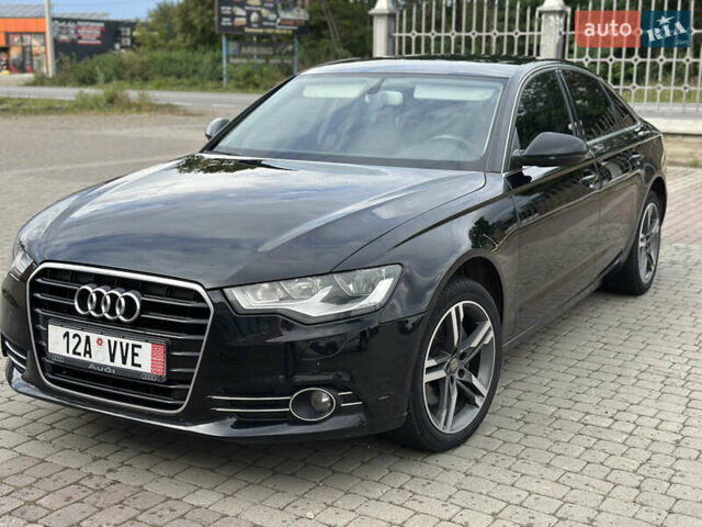 Черный Ауди А6, объемом двигателя 1.97 л и пробегом 235 тыс. км за 14700 $, фото 1 на Automoto.ua