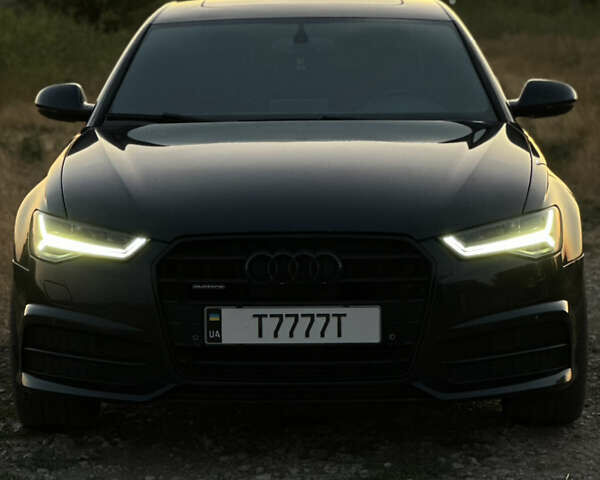 Черный Ауди А6, объемом двигателя 2 л и пробегом 310 тыс. км за 16000 $, фото 1 на Automoto.ua