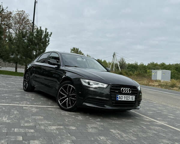 Черный Ауди А6, объемом двигателя 2.97 л и пробегом 244 тыс. км за 15500 $, фото 1 на Automoto.ua