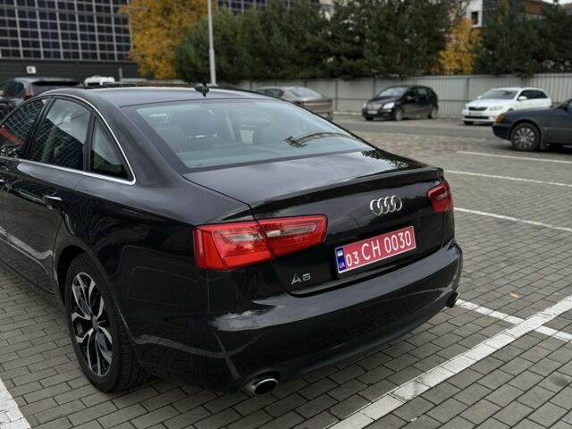 Черный Ауди А6, объемом двигателя 2 л и пробегом 261 тыс. км за 11500 $, фото 1 на Automoto.ua