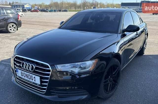Черный Ауди А6, объемом двигателя 1.98 л и пробегом 300 тыс. км за 14100 $, фото 1 на Automoto.ua