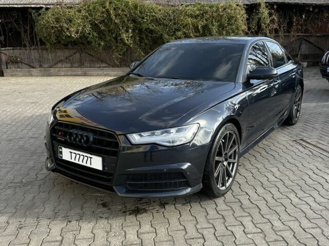 Черный Ауди А6, объемом двигателя 2 л и пробегом 310 тыс. км за 16500 $, фото 1 на Automoto.ua
