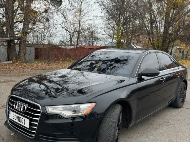 Черный Ауди А6, объемом двигателя 2 л и пробегом 312 тыс. км за 11600 $, фото 1 на Automoto.ua
