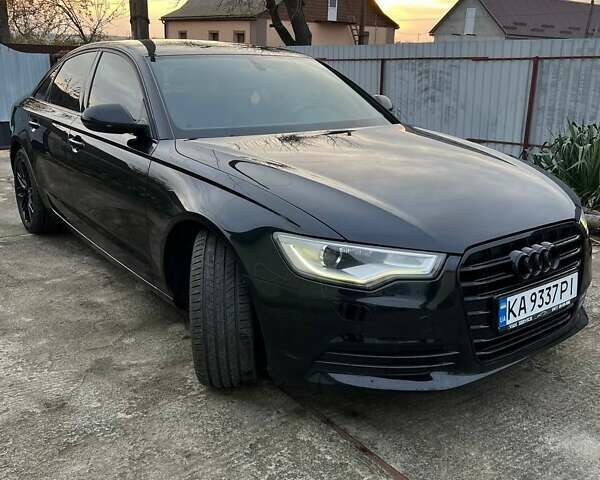 Черный Ауди А6, объемом двигателя 1.97 л и пробегом 312 тыс. км за 14200 $, фото 1 на Automoto.ua