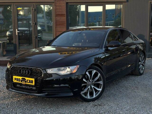 Чорний Ауді А6, об'ємом двигуна 2 л та пробігом 195 тис. км за 14843 $, фото 1 на Automoto.ua
