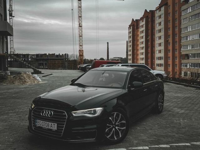 Черный Ауди А6, объемом двигателя 2 л и пробегом 227 тыс. км за 16199 $, фото 1 на Automoto.ua