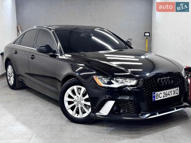 Черный Ауди А6, объемом двигателя 2 л и пробегом 195 тыс. км за 12500 $, фото 1 на Automoto.ua