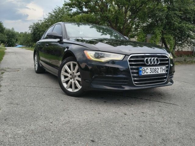 Чорний Ауді А6, об'ємом двигуна 2 л та пробігом 220 тис. км за 11291 $, фото 1 на Automoto.ua