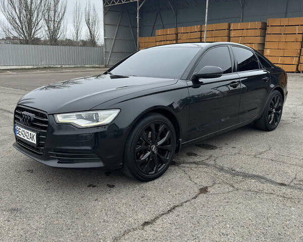 Черный Ауди А6, объемом двигателя 2 л и пробегом 255 тыс. км за 16500 $, фото 1 на Automoto.ua