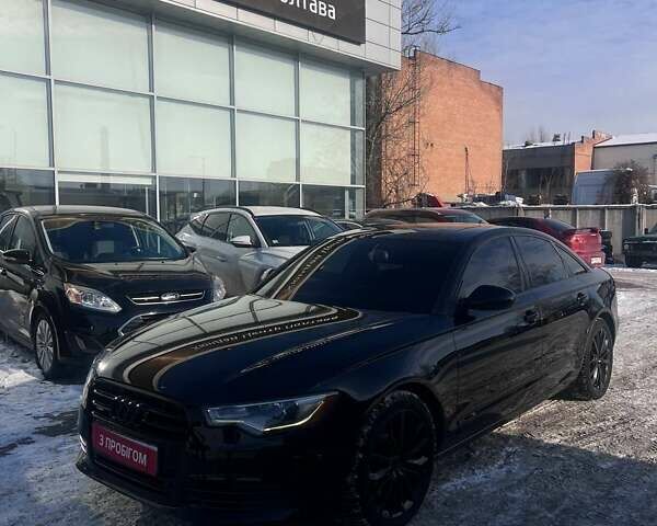 Чорний Ауді А6, об'ємом двигуна 2 л та пробігом 198 тис. км за 14700 $, фото 1 на Automoto.ua