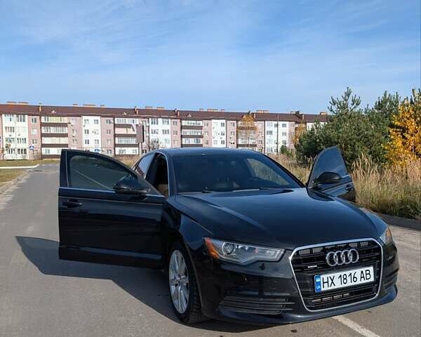 Черный Ауди А6, объемом двигателя 2 л и пробегом 267 тыс. км за 14300 $, фото 1 на Automoto.ua