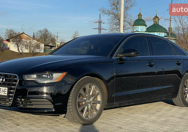 Чорний Ауді А6, об'ємом двигуна 2 л та пробігом 217 тис. км за 13600 $, фото 1 на Automoto.ua