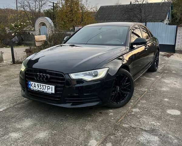 Черный Ауди А6, объемом двигателя 1.97 л и пробегом 311 тыс. км за 15700 $, фото 1 на Automoto.ua